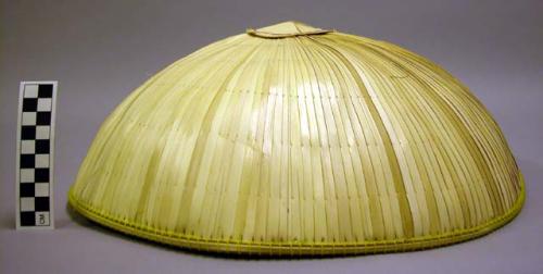 Domed hat with red thread