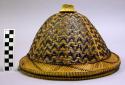 Hat woven with dark and light zigzag pattern
