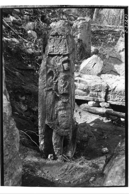 Stela 8 with figure holding decapitated head