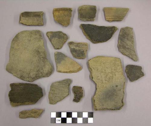 Ceramic rim, body sherds, corrugated, burnished earthenware, fire clouded