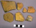 Seven sherds, bowl and jar rims, body, some incised