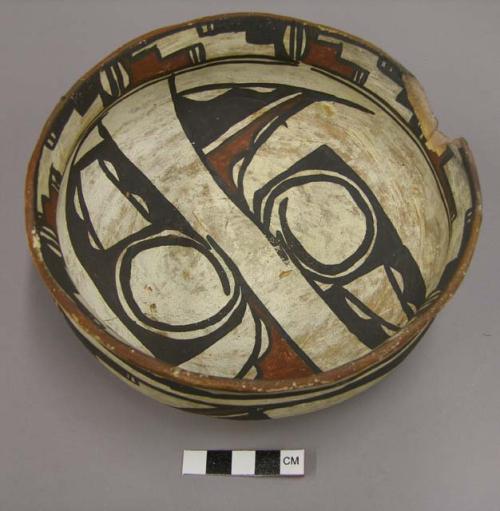 Bowl, polacca polychrome style c. int: Zuni rain bird design; ext: linear design