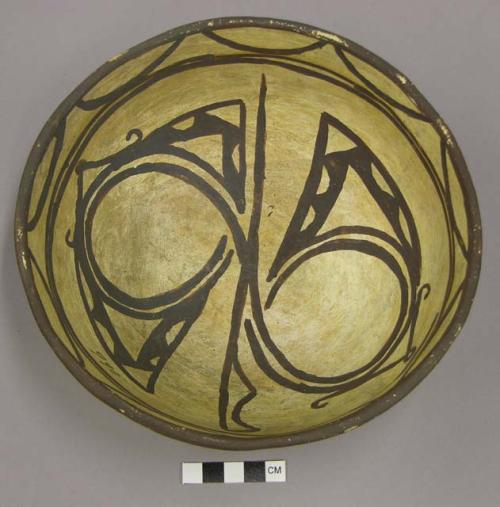 Bowl, polacca polychrome style c. int: zuni rain bird design; ext: slipped, no d