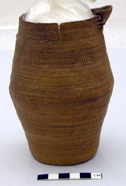 Pitcher-shaped basket