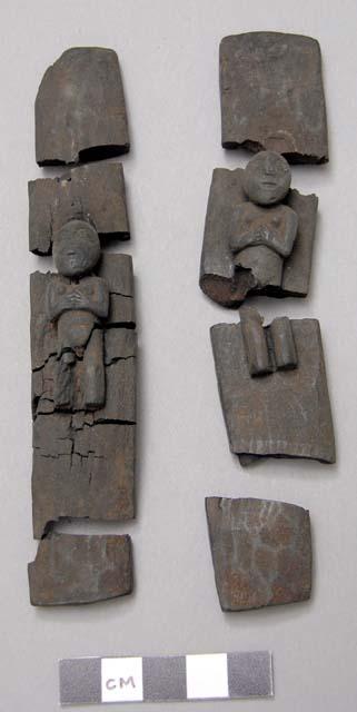 Pieces of wood with human figures on them