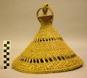 Woven hat with looped finial