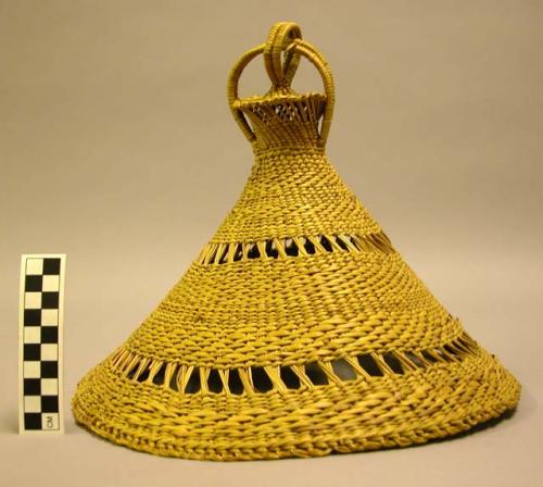 Woven hat with looped finial