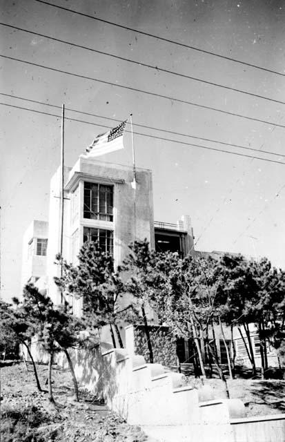 Building with American flag flying