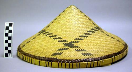 Conical hat with wide checked design