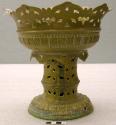 Footed brass pot