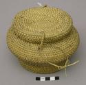 Basket, with lid, oval, carinated body, wrapped loop closure and hinge