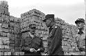 Two men in military uniform talking