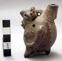 La Selva Brown pottery ocarina -  four holes, anthropomorphic form