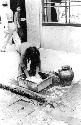 Woman washing dishes