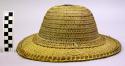 Woven hat with metal disc finial