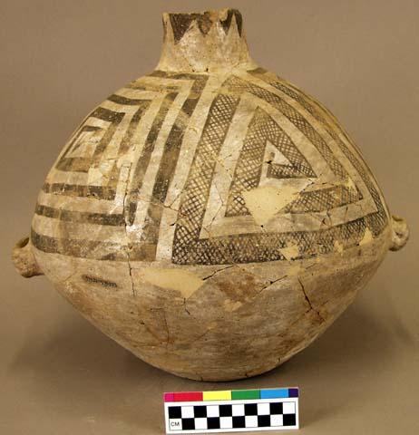 Black-on-white ceramic olla with two rectangular handles