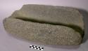 Metate. rectangular, very deep open-ended narrow trough. 14.0 cm. deep. rounded