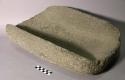 Metate. rectangular open-ended trough. deep with thin, rounded sides. rounded bo