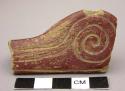 Red polished and incised pottery pipe stem