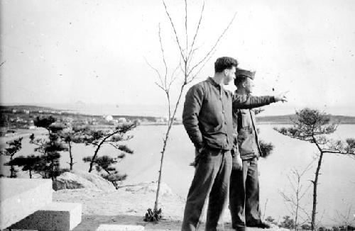 Soldiers overlooking water