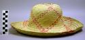 Hat woven with wide pink and green check pattern