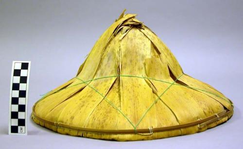 Woven leaf hat with green plastic thread