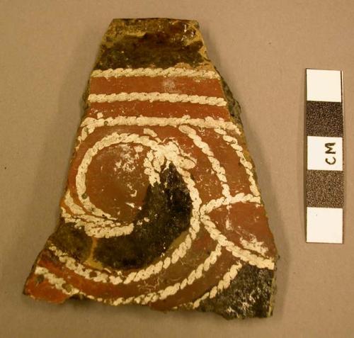 Ceramic, earthenware rim sherd, polychrome slipped, cord-impressed design