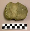 Gound stone axe, grooved, loss at one side near blade edge