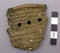 Ceramic, cord-impressed, punched rimsherd