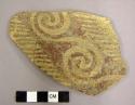 Ceramic sherd, body sherd, red spiral and linear designs on exterior