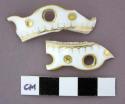 Ceramic, porcelain, white and gold sherds with decorative holes