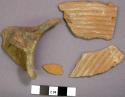 Four terra cotta sherds, possibly from one jar