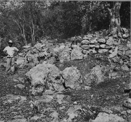 Stone enclosure adjoining platform of structure