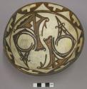 Bowl, polacca polychrome style c. int: zuni rain bird design; ext: slipped, no d