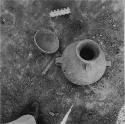 Pots in situ; Showing Reference to Animal Bones