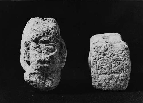 Two-headed sculpture and top of temple sculpture