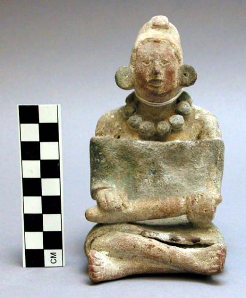 Figurine; seated female figure with ornamentation