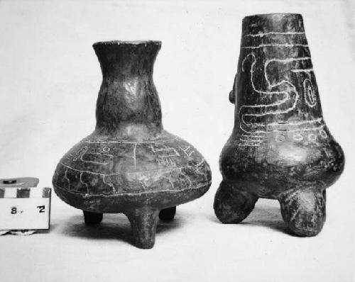 2 incised effigy jars, conceivably fakes. Black surfaces.