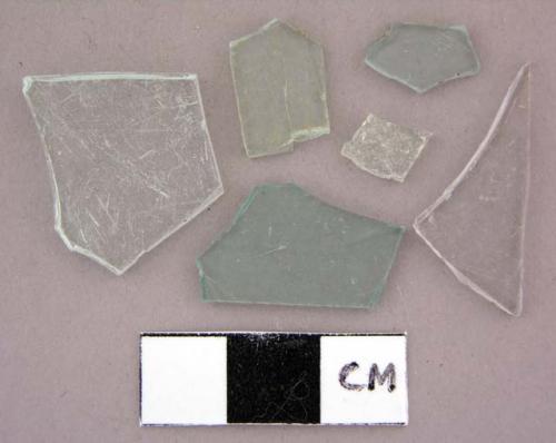 Glass, flat, window, colorless and frosted green fragments