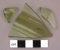 Glass, olive green bottle glass, thin fragments