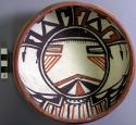 Bowl, polacca polychrome style c. int: kachina design; ext: slipped, no design.