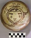 Bowl, polacca polychrome style c. int: kachina design; ext: slipped, no design.