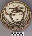 Bowl, polacca polychrome style c. int: kachina design; ext: slipped, no design.