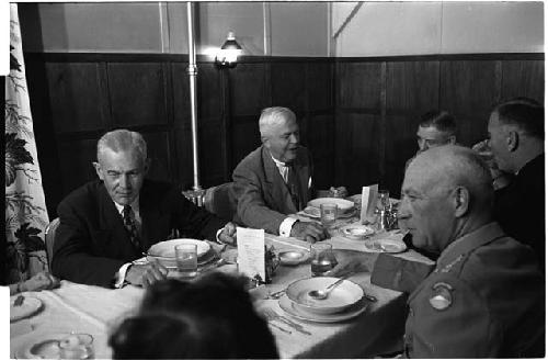 People sitting at a dinner table