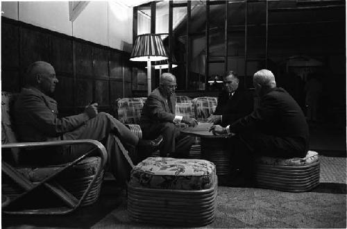 Men sitting in a lounge