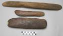 3 batten shaped wooden objects