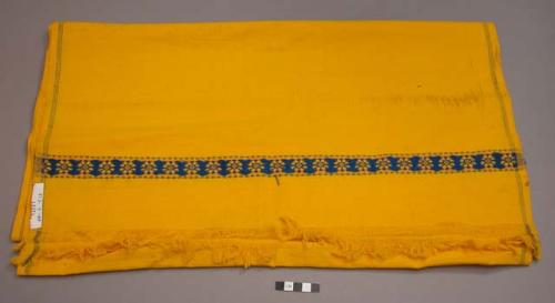 Cloth; cotton; fringed, yellow.