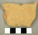 Ceramic body sherd, one side undecorated, one side textile impressed design