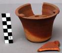 Small model of pottery stove - shape of bucket with hole near +