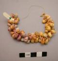 String of shell beads (registroma grande, gray), used as necklace